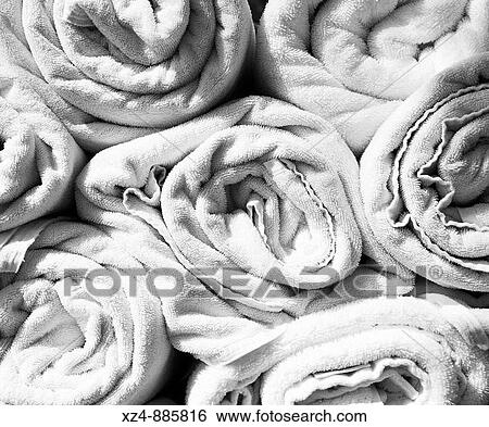 rolled up towels waiting to be of service View Large Photo Image Stock Photograph - rolled up towels waiting to be of service. Fotosearch