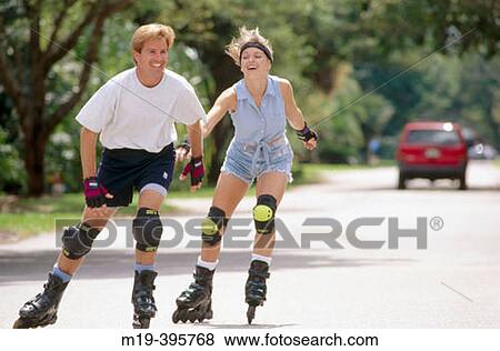 rollerblading couple View Large Photo Image Stock Photo - rollerblading couple. Fotosearch
