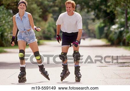 rollerblading couple View Large Photo Image Stock Photo - rollerblading couple. Fotosearch