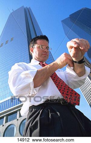 Rolling up sleeves View Large Photo Image Stock Image - Rolling up sleeves. Fotosearch
