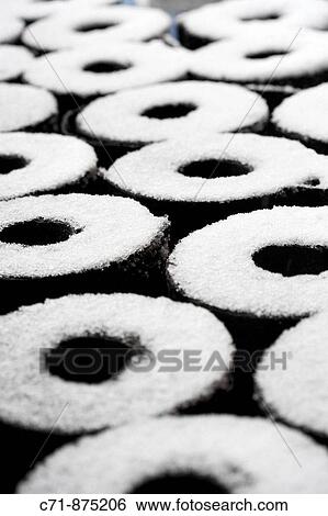 Rolls of construction tar paper with snow on top View Large Photo Image Stock Photograph - Rolls of construction tar paper with snow on top. Fotosearch