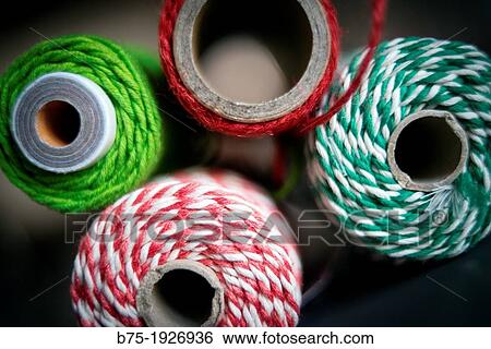 Rolls of different colored string View Large Photo Image Stock Photograph - Rolls of different colored string. Fotosearch