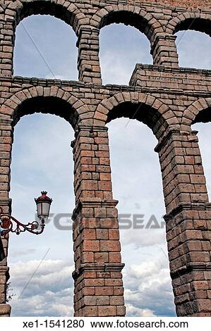 Roman aqueduct, Segovia, Castilla-Leon, Spain View Large Photo Image Stock Image - Roman aqueduct, Segovia, Castilla-Leon, Spain. Fotosearch
