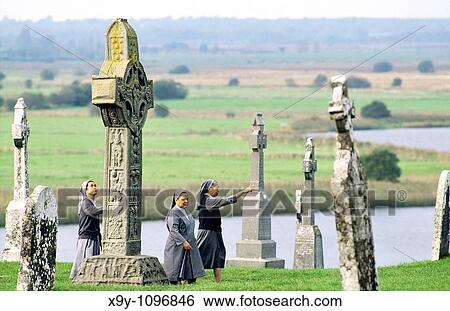 Roman Catholic nuns visit Clonmacnoise Monastery on the River Shannon, County Offaly, Ireland Founded AD 547 by Saint Ciaran View Large Photo Image Stock Photograph - Roman Catholic nuns visit Clonmacnoise Monastery on the River Shannon, County Offaly, Ireland Founded AD 547 by Saint Ciaran. Fotosearch
