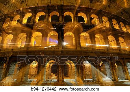 Stock Image - Roman Coliseum. Started between 70-72 AD under emperor Vespasian, completed in 80 AD under Titus. Rome, Italy.. Fotosearch