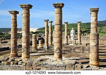 Roman ruins of Baelo Claudia, at Bolonia, Cadiz Province, Spain Statue of the Emperor Trajan in the Basilica beside the Forum View Large Photo Image Stock Image - Roman ruins of Baelo Claudia, at Bolonia, Cadiz Province, Spain Statue of the Emperor Trajan in the Basilica beside the Forum. Fotosearch