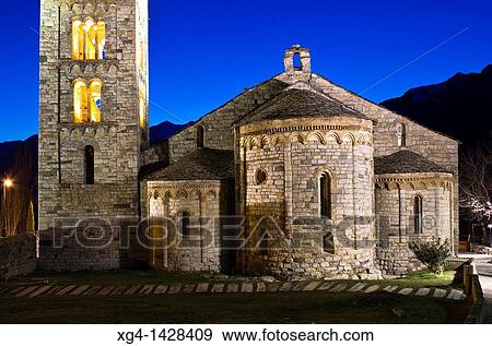 Stock Photo - Romanesque church of Sant Climent lit -Ta? ll - Vall de Boi - Pyrenees - Lleida Province - Catalonia - Catalua - Spain. Fotosearch