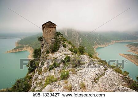 Stock Photo - Romanesque hermitage of Mare de Deu de la Pedra? ger Valley Montsec d? Ares Lleida Pyrenees Mountains Catalonia Spain.. Fotosearch
