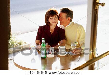 romantic couple at a cafe View Large Photo Image Stock Photography - romantic couple at a cafe. Fotosearch