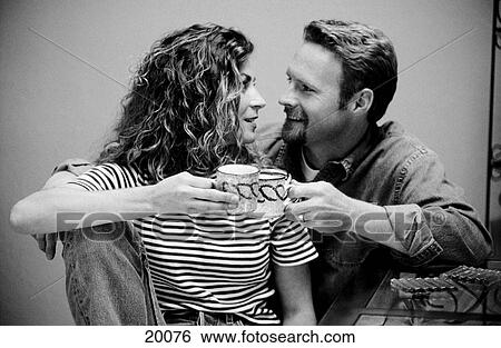 Romantic couple at home View Large Photo Image Stock Photograph - Romantic couple at home. Fotosearch