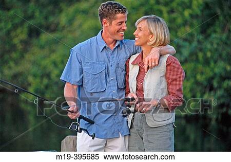 romantic couple fishing View Large Photo Image Stock Photography - romantic couple fishing. Fotosearch