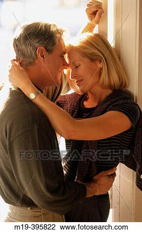 romantic couple in a doorway View Large Photo Image Stock Image - romantic couple in a doorway. Fotosearch