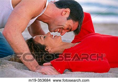 Romantic Couple on beach View Large Photo Image Picture - Romantic Couple on beach. Fotosearch