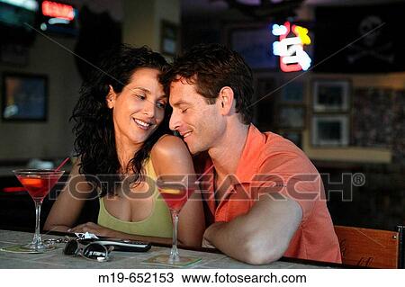 Romantic moment at a bar View Large Photo Image Stock Image - Romantic moment at a bar. Fotosearch