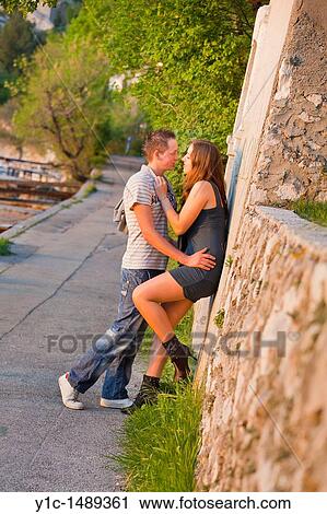 Romantic young couple in a late afternoon View Large Photo Image Stock Image - Romantic young couple in a late afternoon. Fotosearch