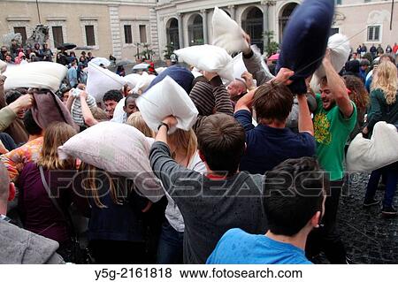 Rome Italy. 13th April 2014. International Pillow Fight Day in Piazza Santa Maria in Trastevere Square in Rome Italy. View Large Photo Image Stock Photo - Rome Italy. 13th April 2014. International Pillow Fight Day in Piazza Santa Maria in Trastevere Square in Rome Italy.. Fotosearch