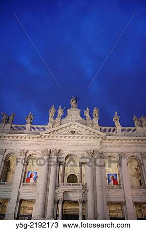 Stock Image - Rome, Italy. 30th April 2014 Images of Pope John Paul II and Pope John XXIII who were recently declared Saints on San Giovanni Basilica in Rome, Italy.. Fotosearch