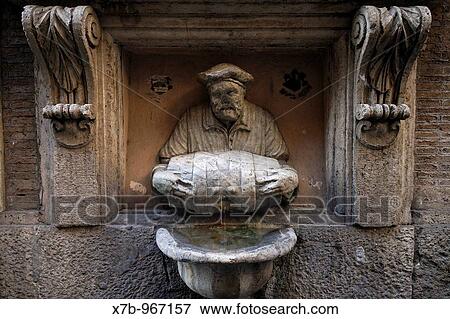 Rome Italy Il Facchino? The Porter? fountain c 1580 on Palazzo de Carolis, via del Corso View Large Photo Image Stock Photo - Rome Italy Il Facchino? The Porter? fountain c 1580 on Palazzo de Carolis, via del Corso. Fotosearch