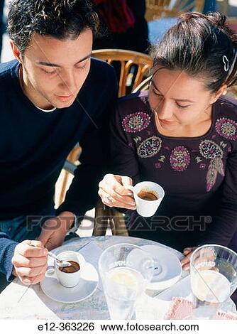 Stock Photograph - Romeo & Juliett pilgrims. Coffee at caff? Filippini. Piazza dell? Erbe. Verona. Veneto. Italy.. Fotosearch