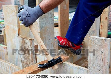 Roofing hammer, hand tools for construction, construction worker, Preparation of formwork for construction of pit with concrete, House Construction, Basque Country, Spain View Large Photo Image Stock Image - Roofing hammer, hand tools for construction, construction worker, Preparation of formwork for construction of pit with concrete, House Construction, Basque Country, Spain. Fotosearch