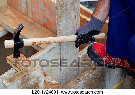 Roofing hammer, hand tools for construction, construction worker, Preparation of formwork for construction of pit with concrete, House Construction, Basque Country, Spain View Large Photo Image Stock Image - Roofing hammer, hand tools for construction, construction worker, Preparation of formwork for construction of pit with concrete, House Construction, Basque Country, Spain. Fotosearch