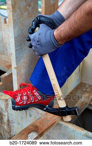Roofing hammer, hand tools for construction, construction worker, Preparation of formwork for construction of pit with concrete, House Construction, Basque Country, Spain View Large Photo Image Stock Photo - Roofing hammer, hand tools for construction, construction worker, Preparation of formwork for construction of pit with concrete, House Construction, Basque Country, Spain. Fotosearch