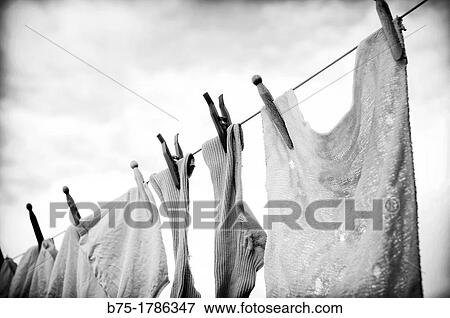 Stock Photo - ropa tendida al aire libre, hanging clothes outdoors. Fotosearch