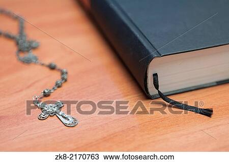 Rosary beads and a holy bible. View Large Photo Image Stock Image - Rosary beads and a holy bible.. Fotosearch