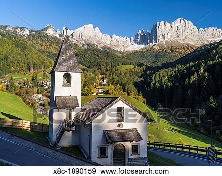 Rosengarten also called Catinaccio mountain range in the Dolomites of South Tyrol Alto Adige during autumn View Large Photo Image Stock Photo - Rosengarten also called Catinaccio mountain range in the Dolomites of South Tyrol Alto Adige during autumn. Fotosearch
