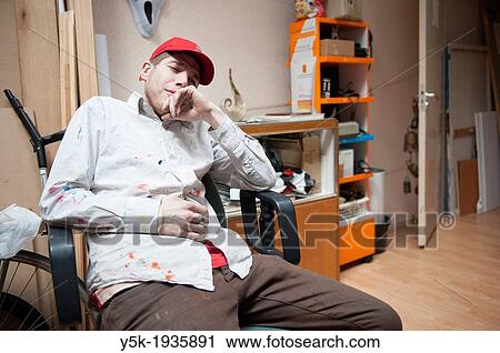 Rotterdam, Netherlands. Artist-painter, having a break in the office near his studio. View Large Photo Image Stock Image - Rotterdam, Netherlands. Artist-painter, having a break in the office near his studio.. Fotosearch