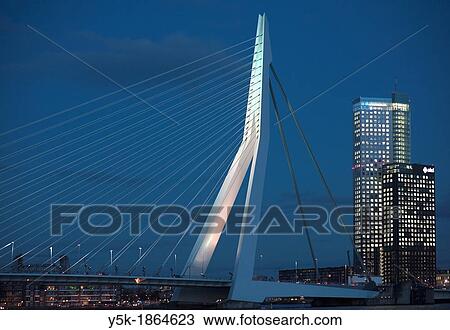 Rotterdam, Netherlands Skyline at night with Erasmusbrug / Erasmus-bridge and Deloitte skyscraper View Large Photo Image Stock Image - Rotterdam, Netherlands Skyline at night with Erasmusbrug / Erasmus-bridge and Deloitte skyscraper. Fotosearch