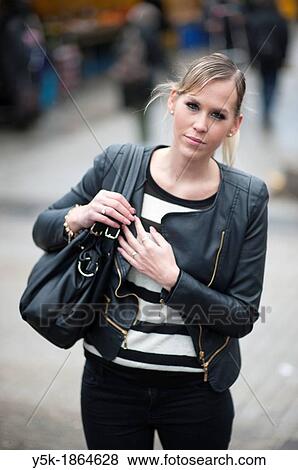 Rotterdam, Netherlands. Young, attractive woman in tuesday market. View Large Photo Image Stock Photo - Rotterdam, Netherlands. Young, attractive woman in tuesday market.. Fotosearch