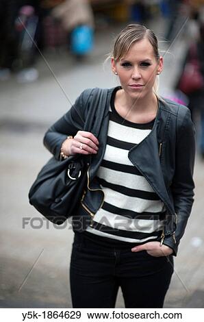 Rotterdam, Netherlands. Young, attractive woman in tuesday market. View Large Photo Image Stock Photo - Rotterdam, Netherlands. Young, attractive woman in tuesday market.. Fotosearch