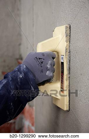 Roughcast, grout float, new homes under construction, construction site View Large Photo Image Stock Image - Roughcast, grout float, new homes under construction, construction site. Fotosearch