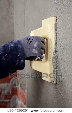 Roughcast, grout float, new homes under construction, construction site View Large Photo Image Stock Image - Roughcast, grout float, new homes under construction, construction site. Fotosearch
