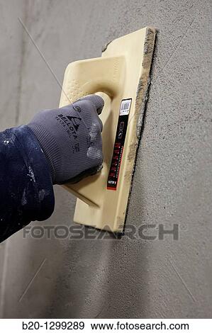 Roughcast, grout float, new homes under construction, construction site View Large Photo Image Stock Photo - Roughcast, grout float, new homes under construction, construction site. Fotosearch