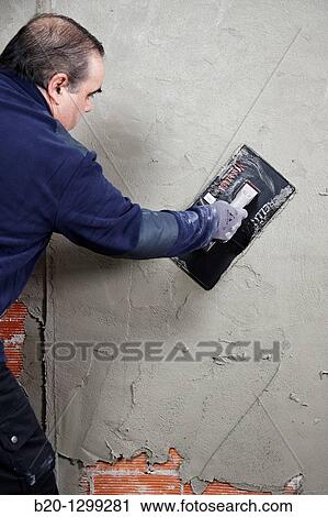 Roughcast, plastering trowel, new homes under construction, construction site View Large Photo Image Stock Image - Roughcast, plastering trowel, new homes under construction, construction site. Fotosearch