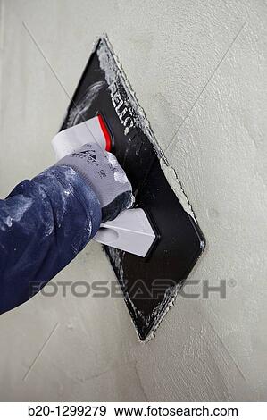 Roughcast, plastering trowel, new homes under construction, construction site View Large Photo Image Stock Photo - Roughcast, plastering trowel, new homes under construction, construction site. Fotosearch