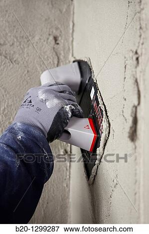Roughcast, plastering trowel, new homes under construction, construction site View Large Photo Image Stock Photo - Roughcast, plastering trowel, new homes under construction, construction site. Fotosearch