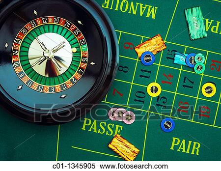 Stock Photography - Roulette wheel with gambling chips. Fotosearch