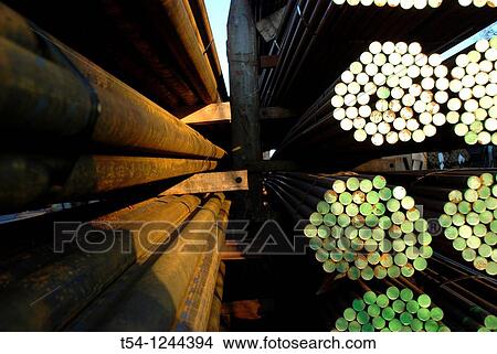Round steel stock of a metal plant View Large Photo Image Picture - Round steel stock of a metal plant. Fotosearch