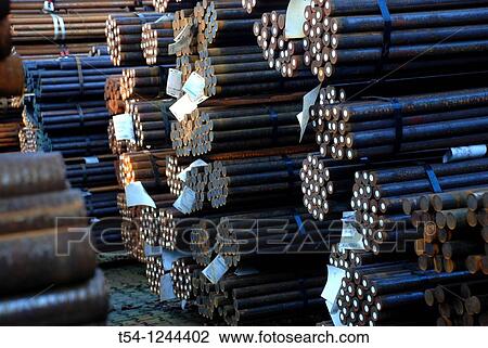Round steel stock of a metal plant View Large Photo Image Stock Image - Round steel stock of a metal plant. Fotosearch