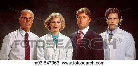 Row of 4 medical and business personnel, looking confidently at camera. Male in shirt and tir; WF in lab coat; WM in suit; WM in lab coat and headset. View Large Photo Image Stock Image - Row of 4 medical and business personnel, looking confidently at camera. Male in shirt and tir; WF in lab coat; WM in suit; WM in lab coat and headset.. Fotosearch