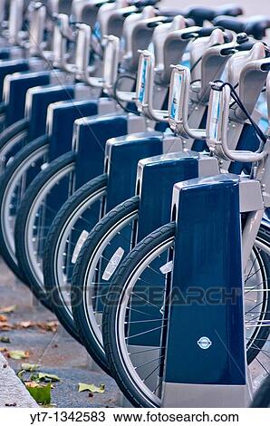 Row of new Mayoral TFL initiative London bicycles for hire seen in Knightsbridge, London, UK View Large Photo Image Stock Image - Row of new Mayoral TFL initiative London bicycles for hire seen in Knightsbridge, London, UK. Fotosearch