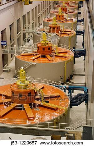 Stock Photo - Row of turbines generating electricity in powerplant at Bonneville Dam hydroelectric, on Columbia River, Washington, USA. Fotosearch