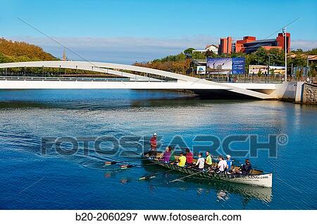 Rowing, Lehendakari Agirre bridge over Urumea river, Donostia (San Sebastian), Basque Country, Spain View Large Photo Image Stock Photo - Rowing, Lehendakari Agirre bridge over Urumea river, Donostia (San Sebastian), Basque Country, Spain. Fotosearch