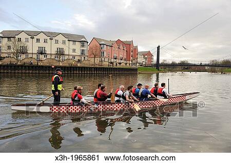 Stock Image - rowing on the River Exe, Historic Quayside, Exeter, Devon county, England, United Kingdom, Europe.. Fotosearch