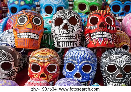 Rows of handpainted ceramic skulls for sale at Zocalo during Day of the Dead, Oaxaca, Mexico. View Large Photo Image Picture - Rows of handpainted ceramic skulls for sale at Zocalo during Day of the Dead, Oaxaca, Mexico.. Fotosearch
