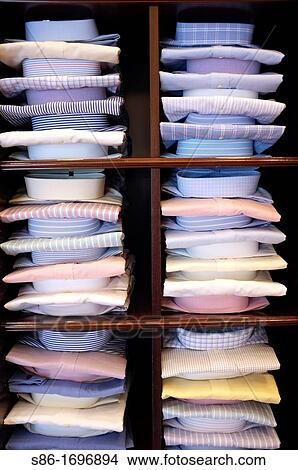 Rows of Men's Dress Shirts Displayed in a Retail Store View Large Photo Image Picture - Rows of Men's Dress Shirts Displayed in a Retail Store. Fotosearch