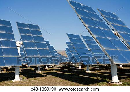 Rows of solar panels, so-called heliostats, generating energy at one of Europe's biggest solar energy fields in the Tabernas Desert, Europe's only true desert Almer? a province, Andaluc? a, Spain View Large Photo Image Stock Image - Rows of solar panels, so-called heliostats, generating energy at one of Europe's biggest solar energy fields in the Tabernas Desert, Europe's only true desert Almer? a province, Andaluc? a, Spain. Fotosearch